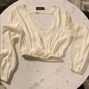 Cropped cream blouse